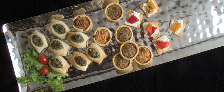 Polished steel buffet serveware